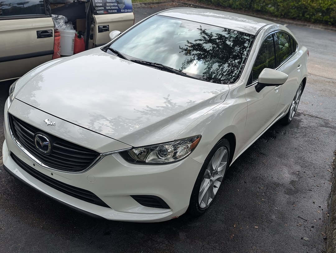 Full Detail, Pet hair removal, headlight restoration, scratch and chip repair and polishing on this 2015 Mazda 6 in Plantation FL